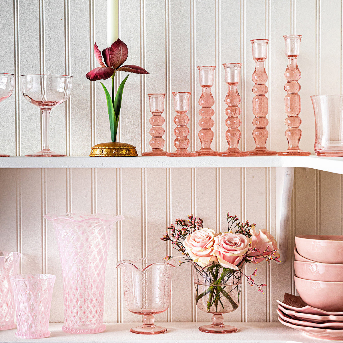 Styled view of Provence 5 inch Candlestick Set of 2 in Blush showcasing mouth-blown glass with pink glassware