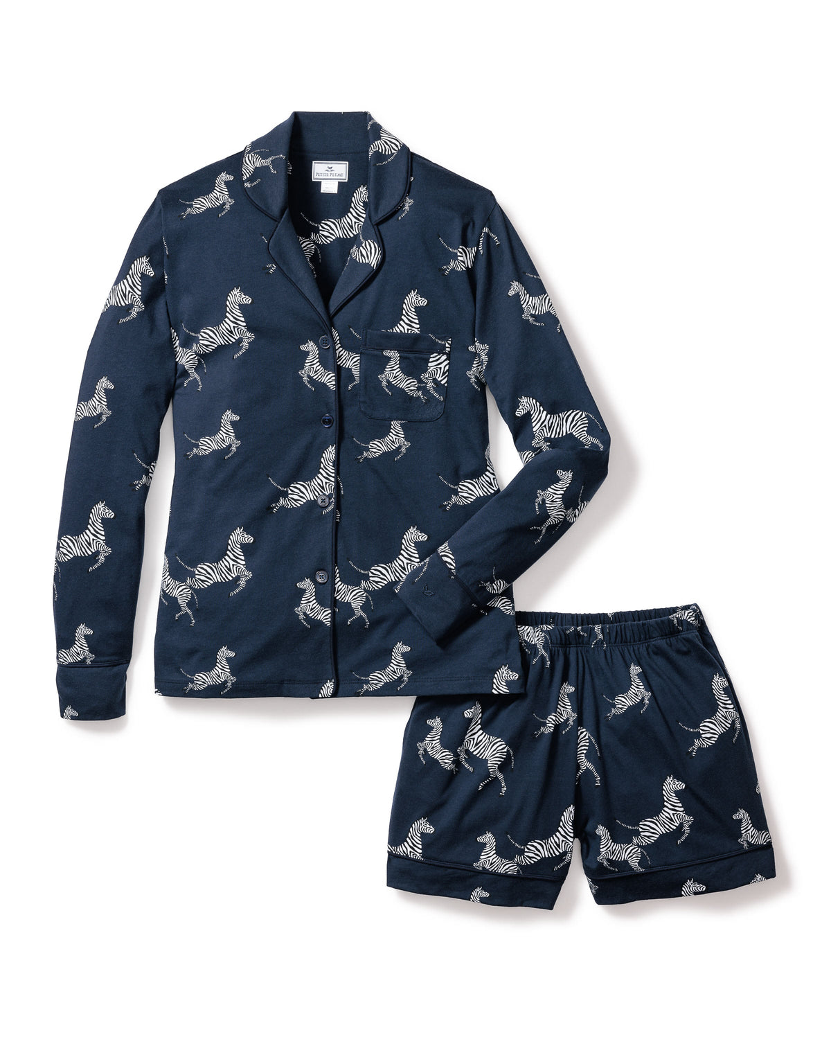 Front view of women’s Pima long sleeve short set in Zèbre de Nuit showcasing navy zebra print and pearl buttons on white background
