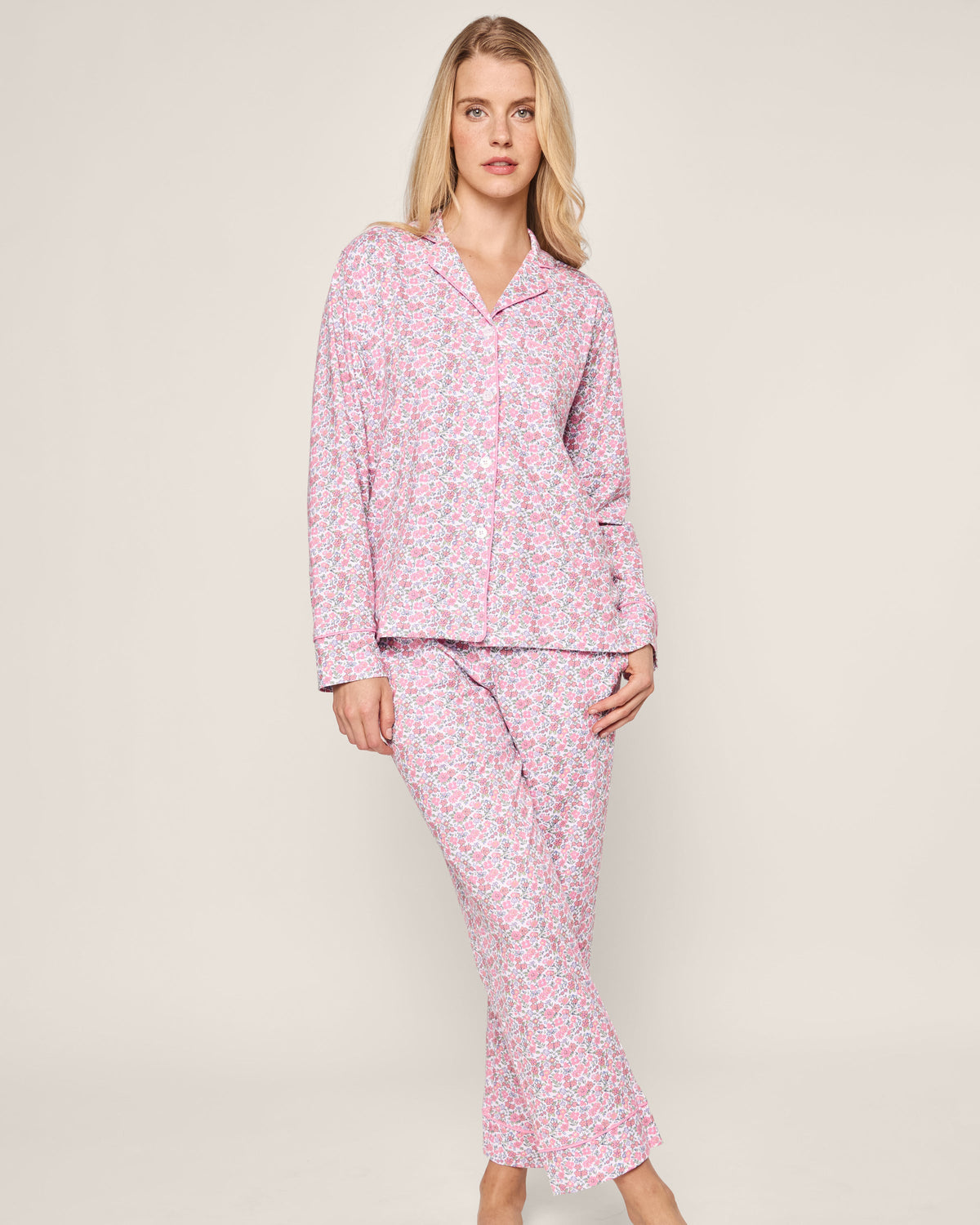 Front view of Women’s Pima Pajama Set in Fleurs de Rose showcasing its pink floral print and piped trim on a model