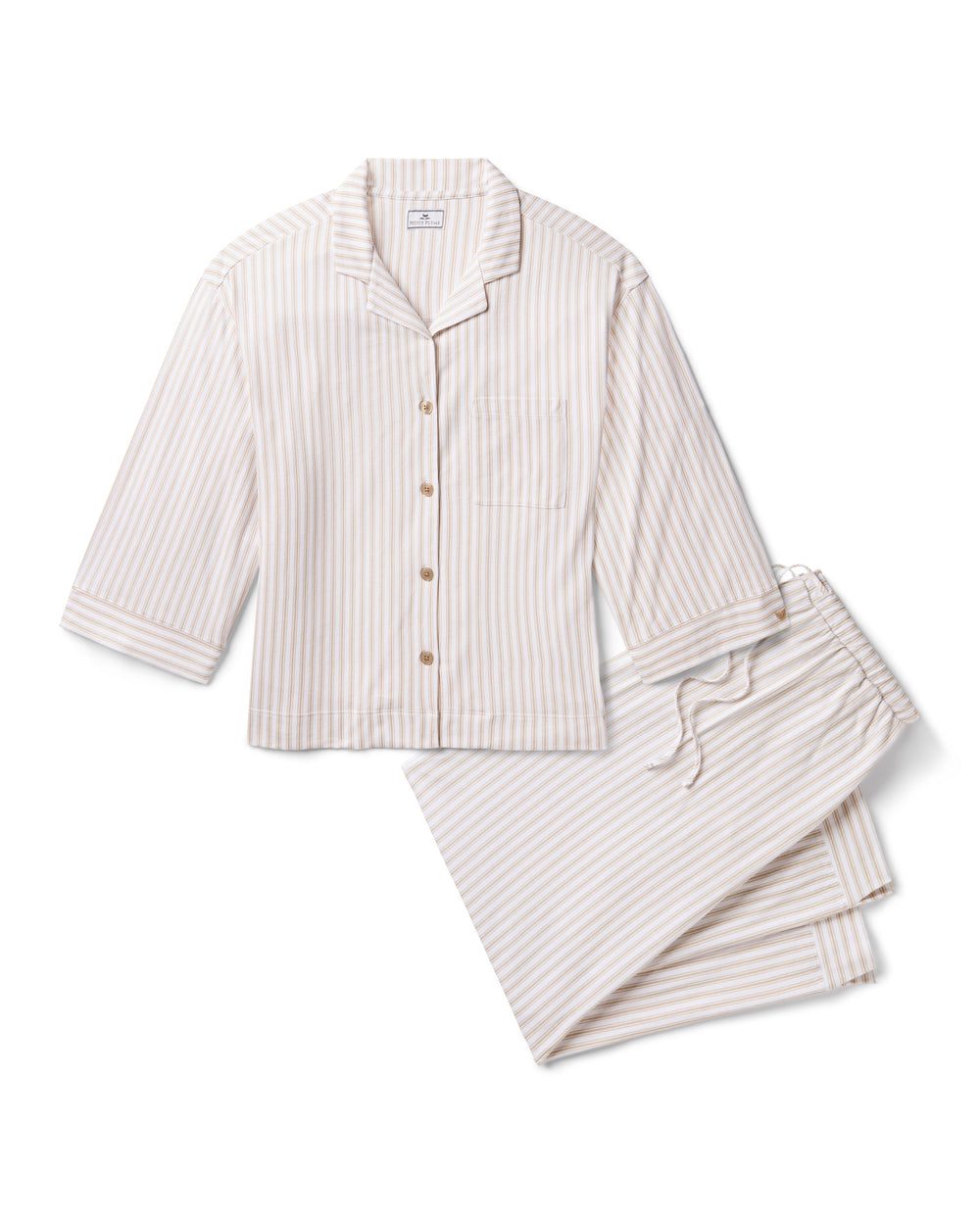Flat lay of The Olivia Pima pajama set in camel ticking with button-front top and wide-leg drawstring pants on white background