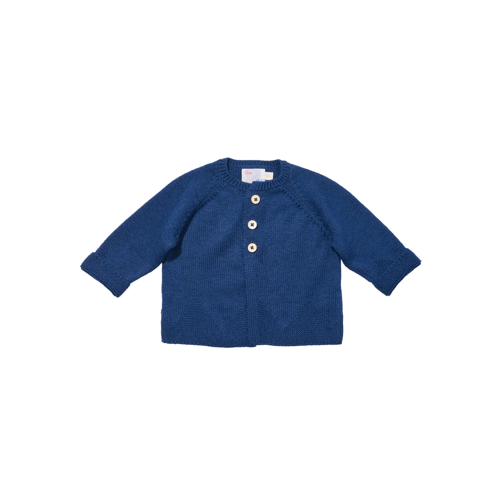 Front flat lay of Paige Cardigan in navy showcasing three stacked buttons, diamond knit texture, and cuffed hems on white background