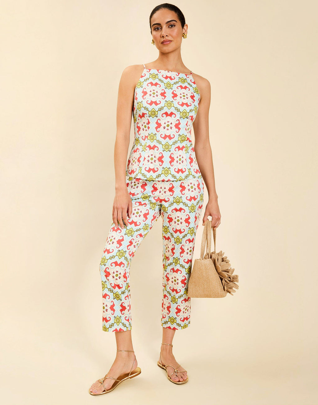 Model wearing the Palau Cigarette Pant in Quatrefoil Sierra print, featuring a slim-fit cropped silhouette, tailored front pleat detailing, side seam pockets, and crisp poplin fabrication.