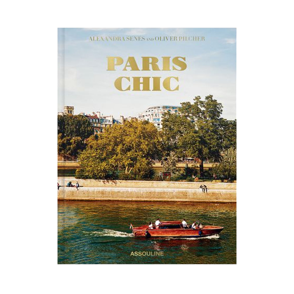 Front cover of Paris Chic hardcover book with gold PARIS CHIC title over a Seine river scene and a wooden motorboat