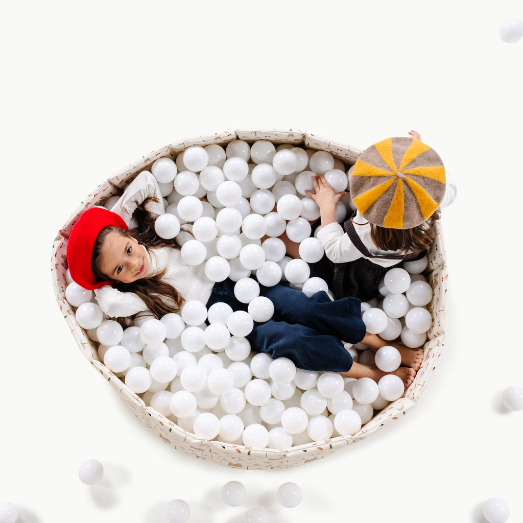 Paris@overhead of kids playing in the paris ball pit