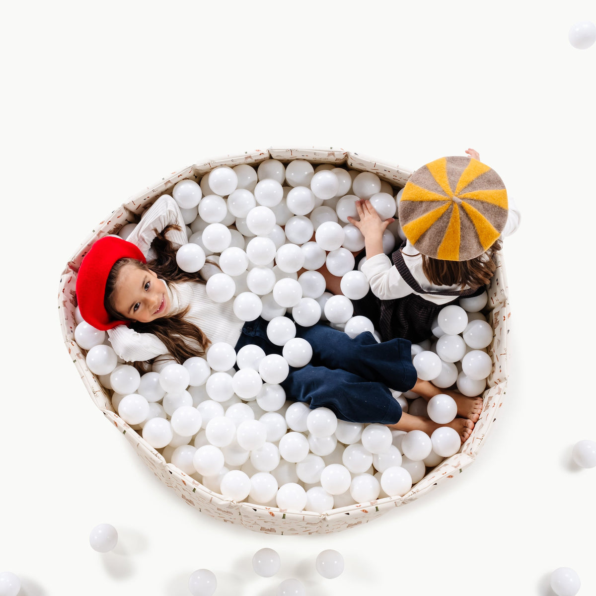 Paris@overhead of kids playing in the paris ball pit