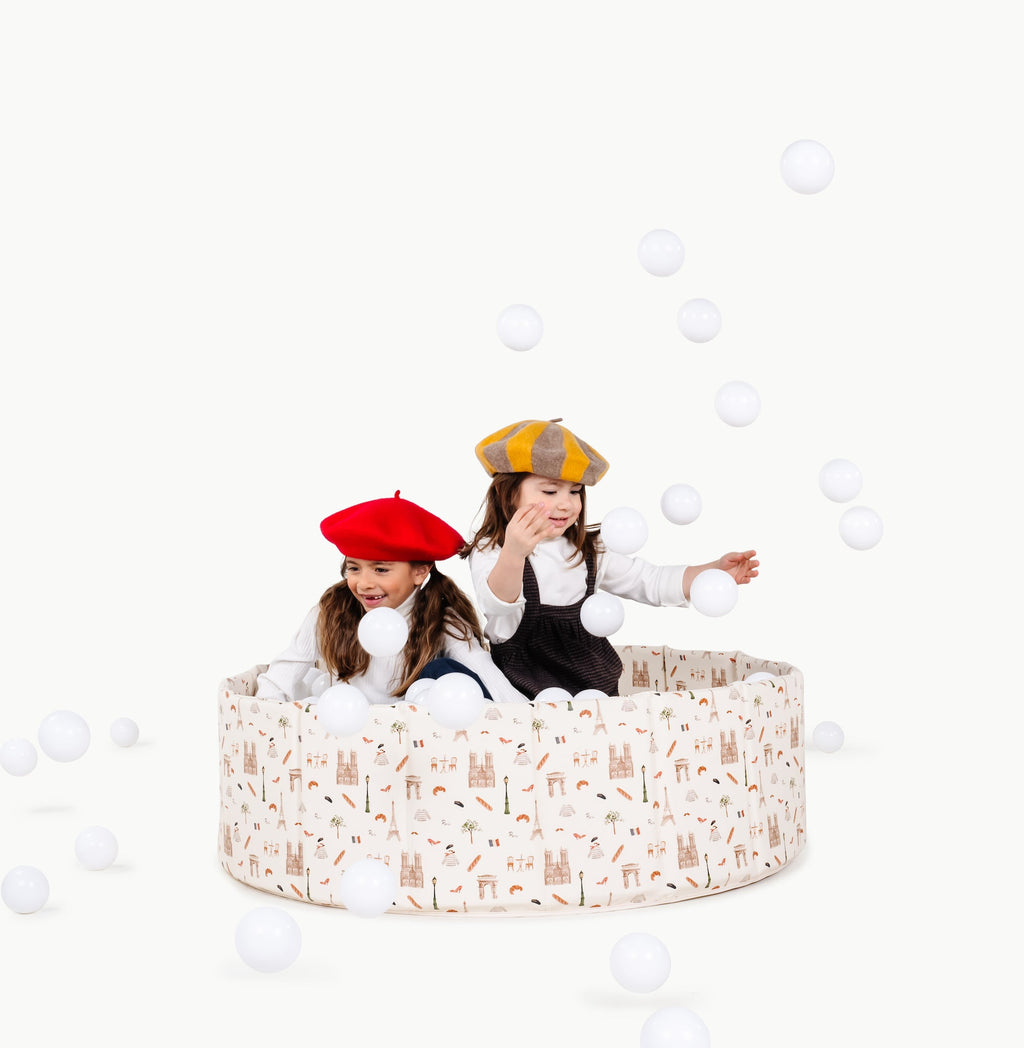 Paris@kids playing in the paris ball pit