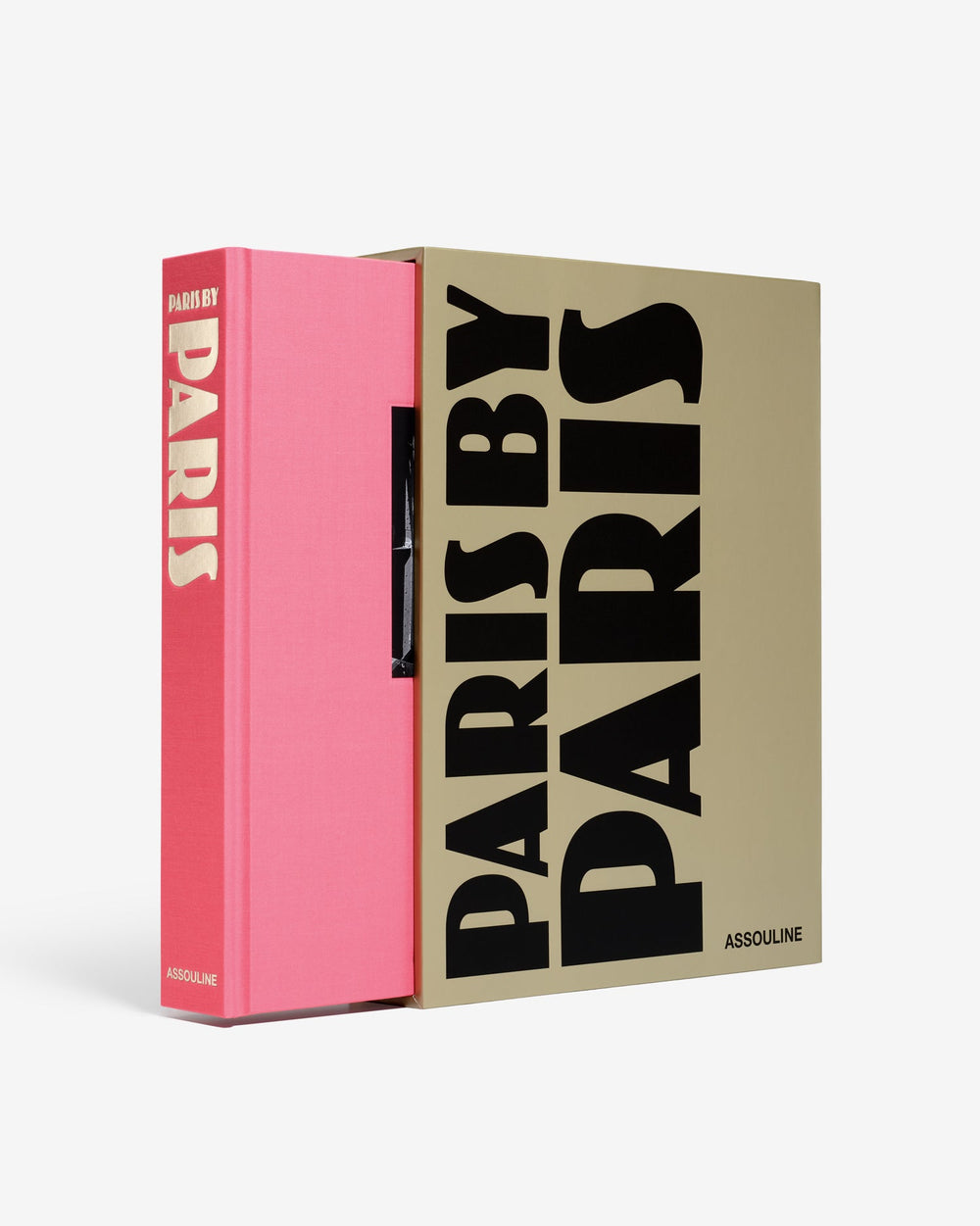 Angled front and spine view of Paris by Paris hardcover in pink cloth with gold lettering, housed in beige slipcase printed with large black ‘PARIS’ on white background