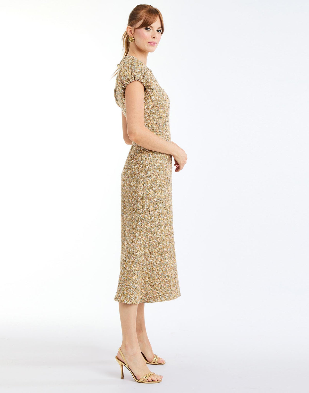 Perla Midi Dress in Gold Multi side – fit-and-flare cocktail midi with puff sleeves, rhinestone bow, crew neckline, and metallic tweed finish by Mestiza New York.