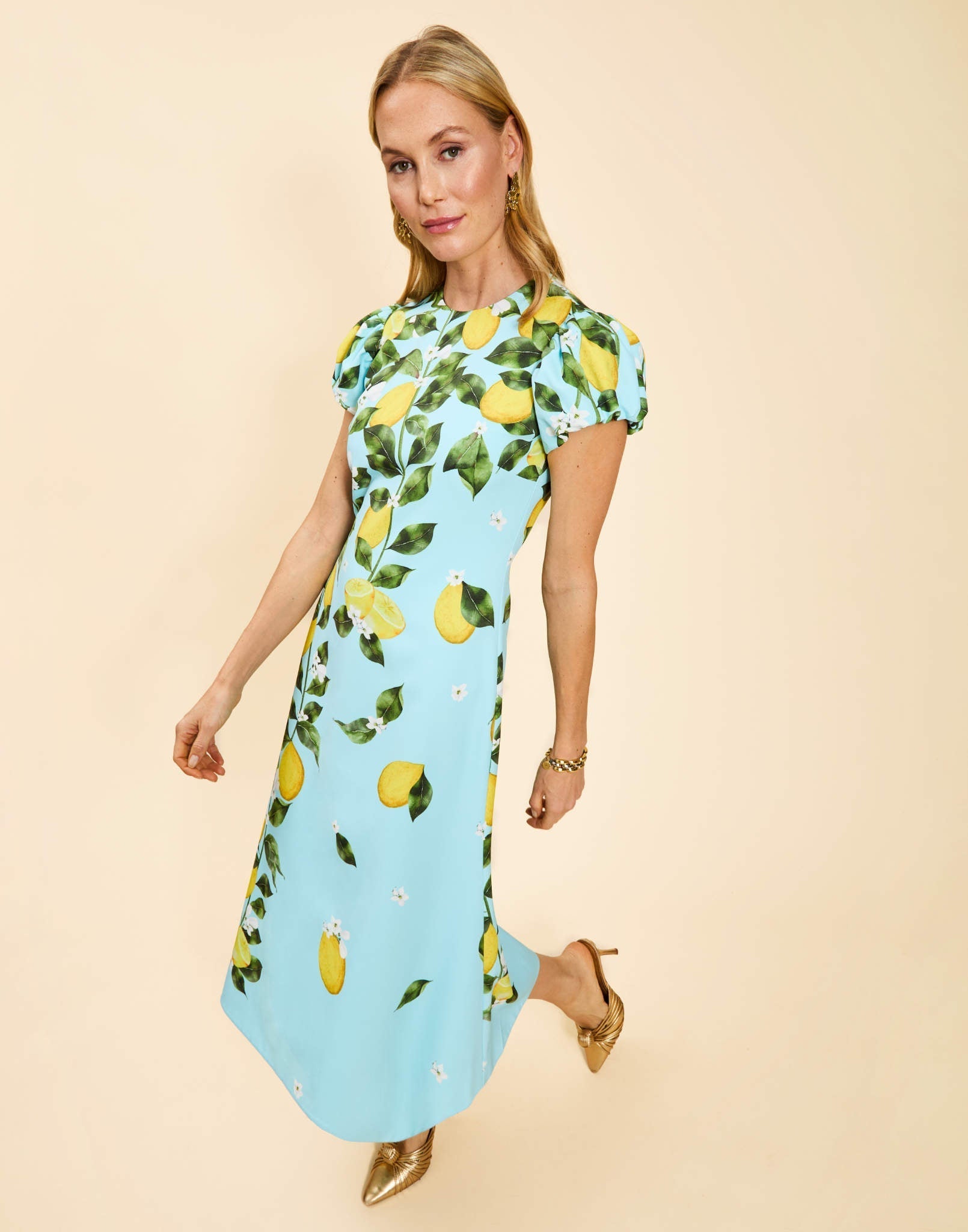 Perla Midi Dress in Sorrento Citrus stretch crepe with puff cap sleeves, crew neckline, and fit-and-flare silhouette.
