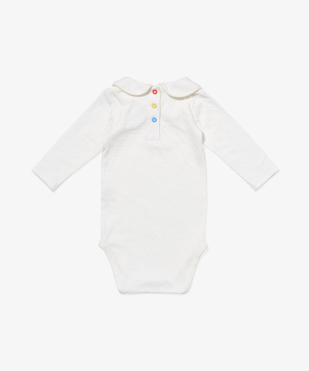 Peter Pan One-piece in Vanilla Piping