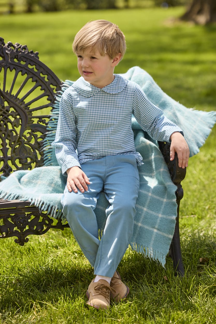 Little English traditional children's clothing.  Classic long sleeve peter pan shirt in blue Alpine Gingham paired with blue Alpine Corduroy pull on pants for toddler boys