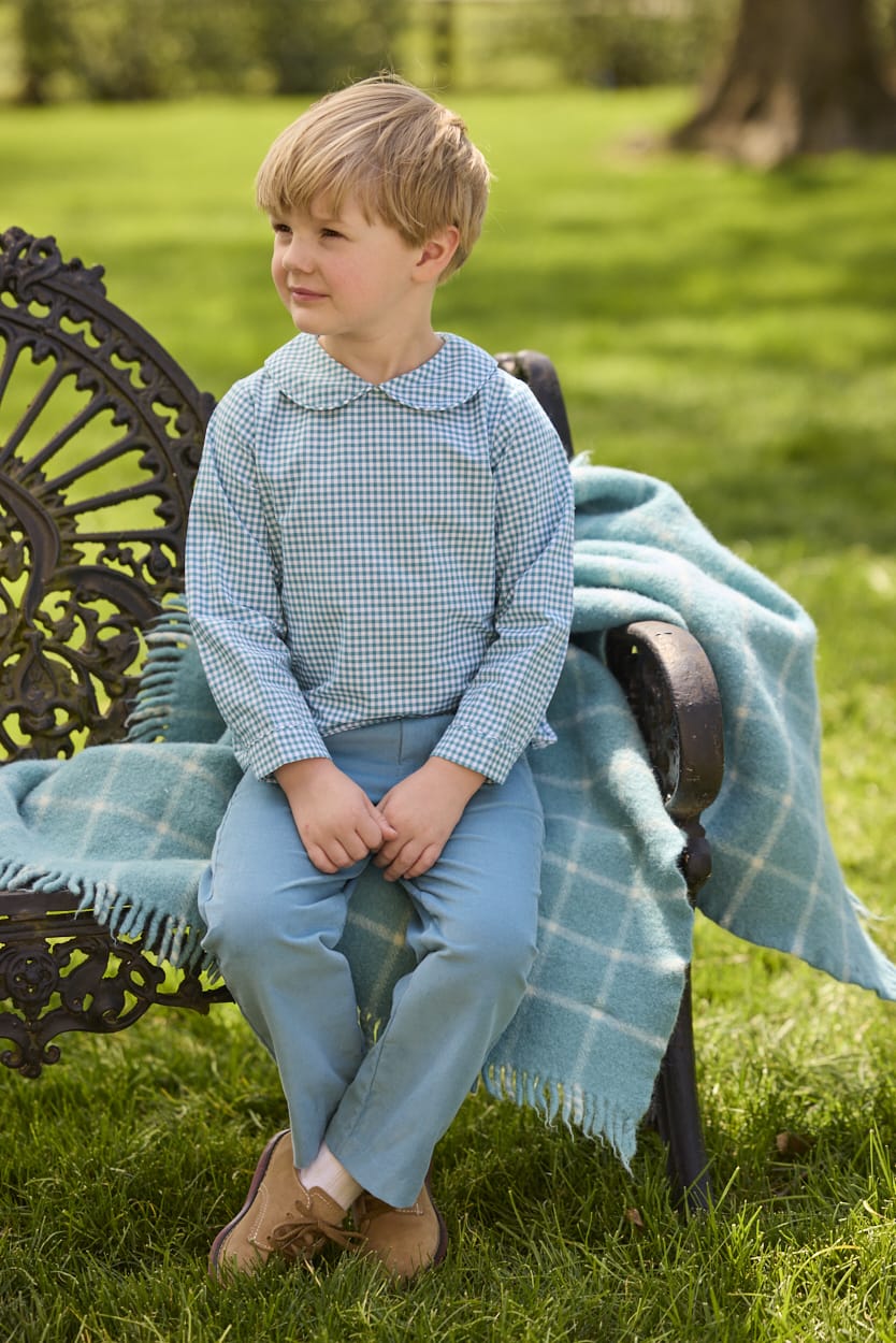 Little English traditional children's clothing.  Classic long sleeve peter pan shirt in blue Alpine Gingham paired with blue Alpine Corduroy pull on pants for toddler boys