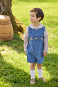 Little English traditional children's clothing.  Khaki Gingham peter pan shirt for toddler boys paired with stormy blue corduroy john john with flying mallard smocking across chest. 