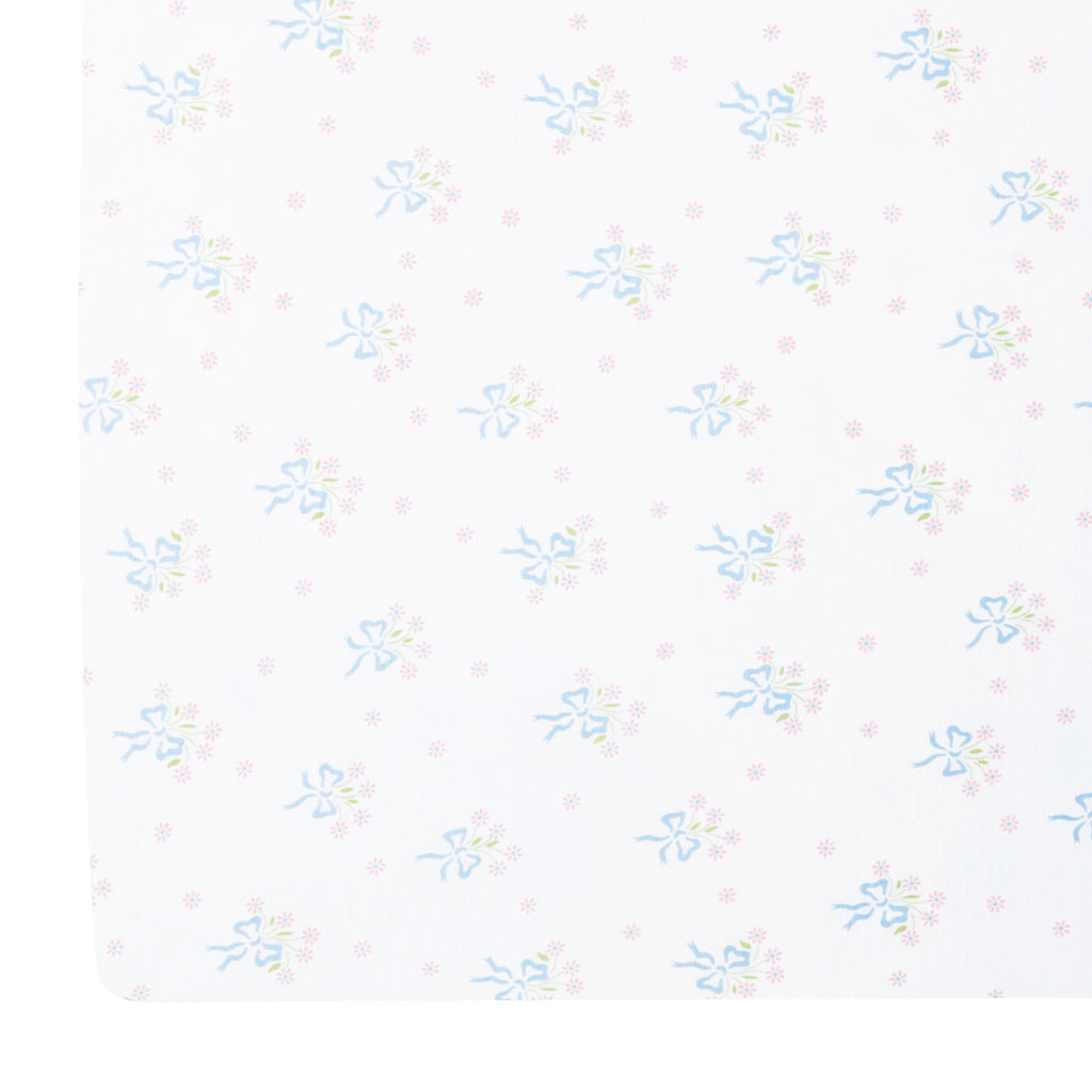 little english classic children's clothing girls pima crib sheet with white background and blue bows with pink floral bouquet all over print 
