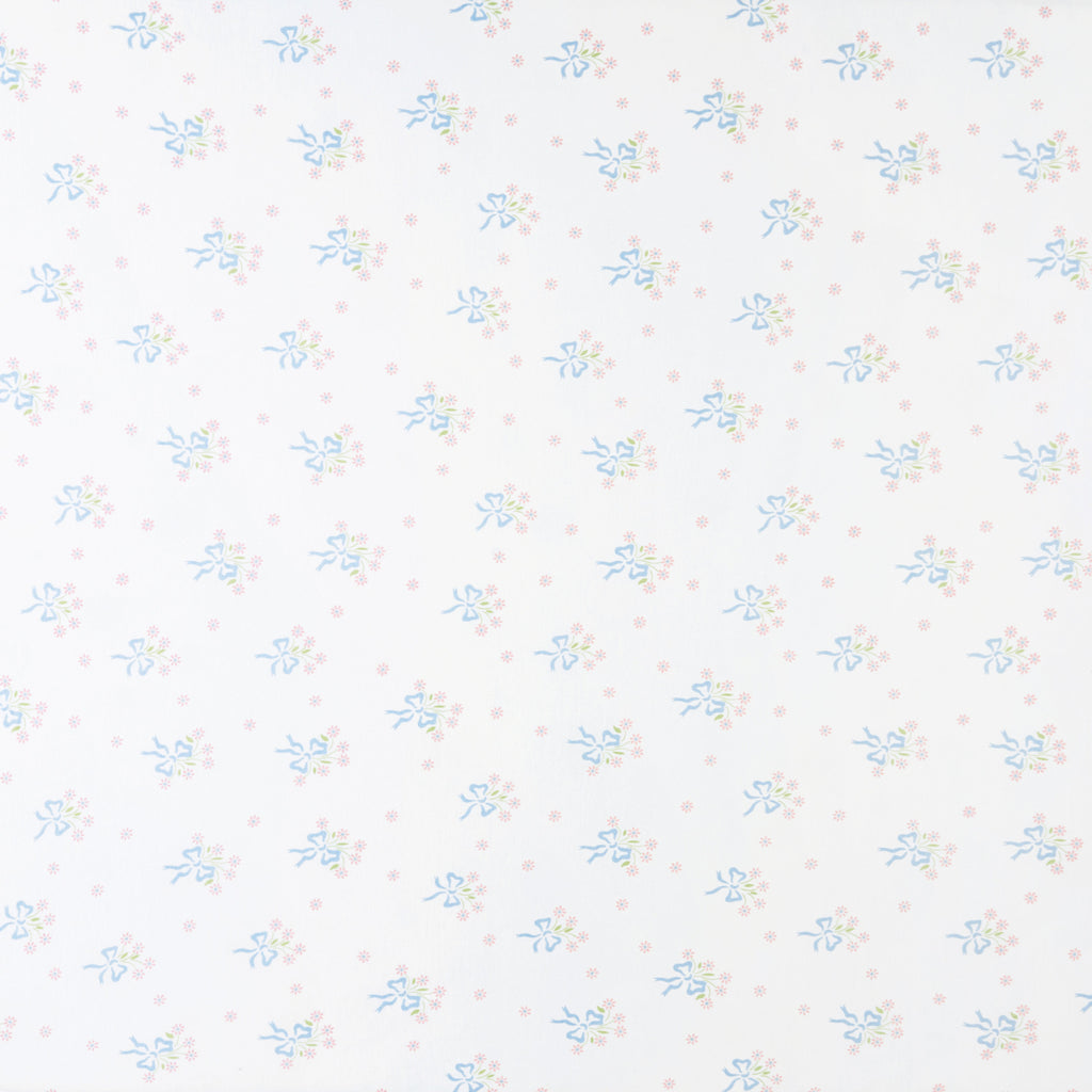 little english classic children's clothing girls pima crib sheet with white background and blue bows with pink floral bouquet all over print 