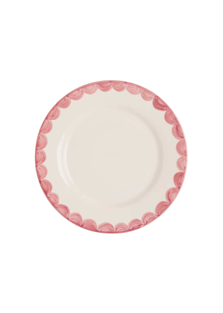 Top view of Late Afternoon pink scallop side plate showcasing its hand-painted scalloped edge on a plain background