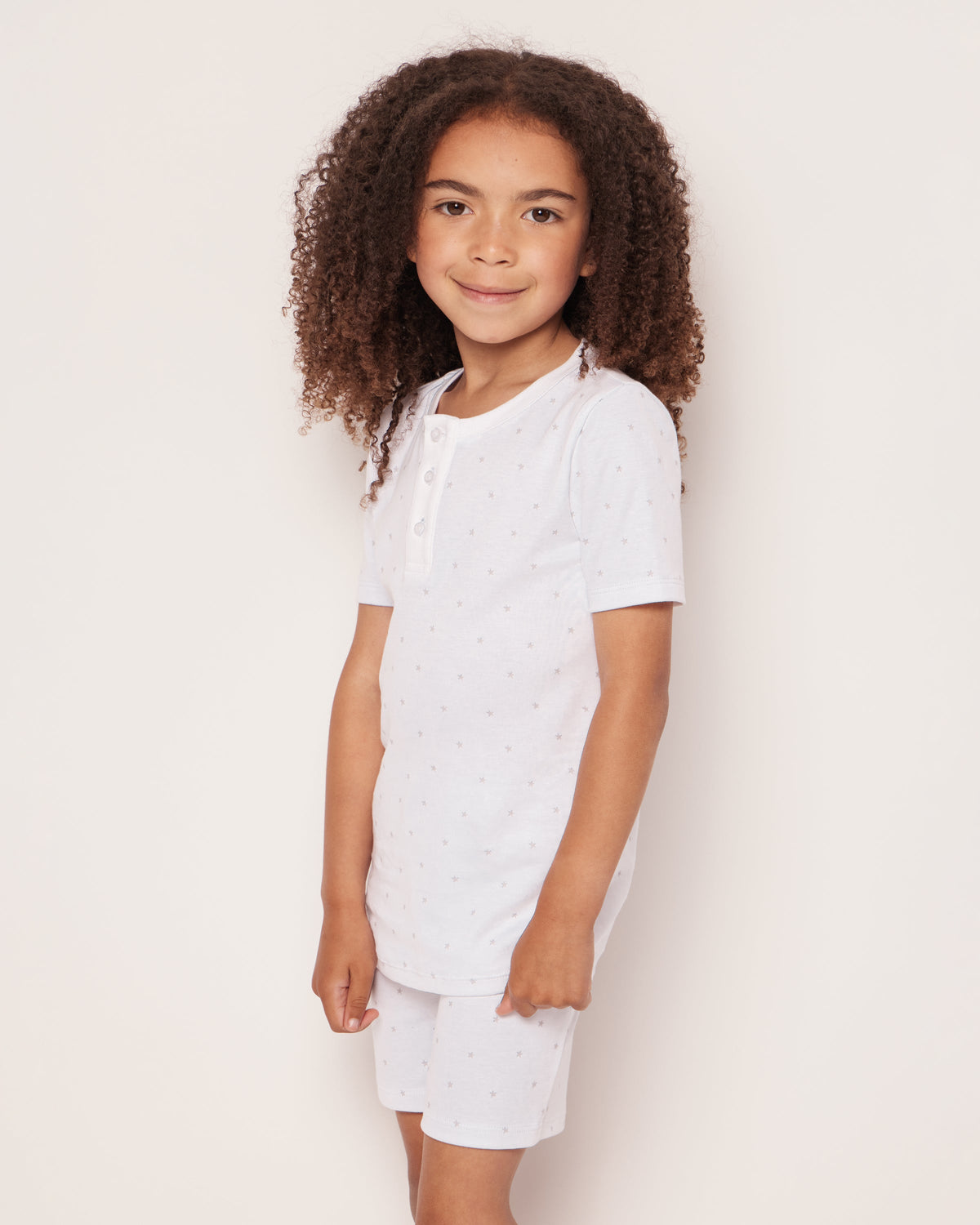 Front view of Kid’s Pima Snug Fit Pajama Short Set in Grey Stars showcasing snug fit and star print against plain background