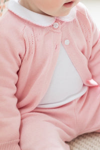 Little English traditional children's clothing. Long sleeve and long pant light pink pointelle sweater set accompanied by a picot peter pan onesie with light pink trim for baby girl