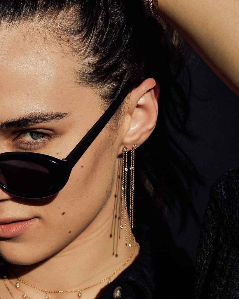 Devon Carlson shown wearing the Poppy Earrings., 14k yellow gold, 14k rose gold, 14k white gold