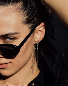 Devon Carlson shown wearing the Poppy Earrings., 14k yellow gold, 14k rose gold, 14k white gold