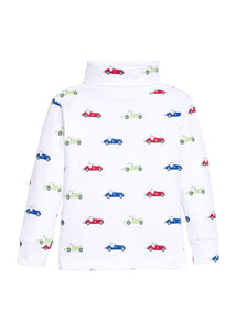 Little English classic children's clothing. White knit turtleneck with red, blue, & green race car print for boys