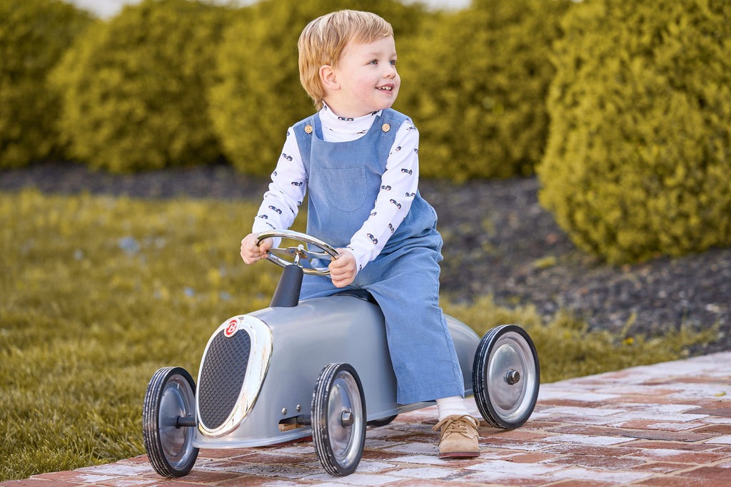 little english classic children's clothing boys white turtleneck with navy vintage race car print, campbell overall in stormy blue corduroy, fall outfits for boys 