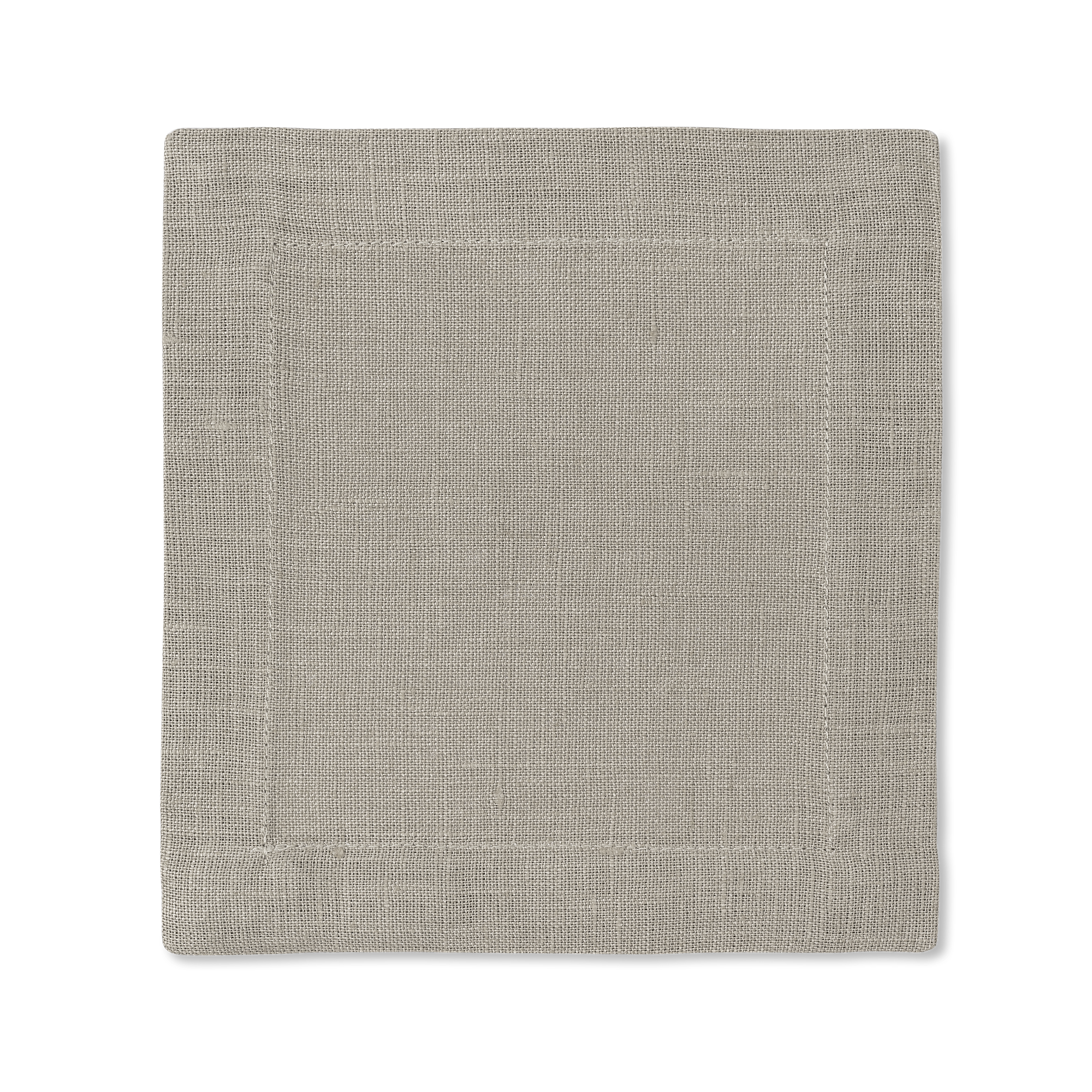 A square linen cocktail napkin in the color sand