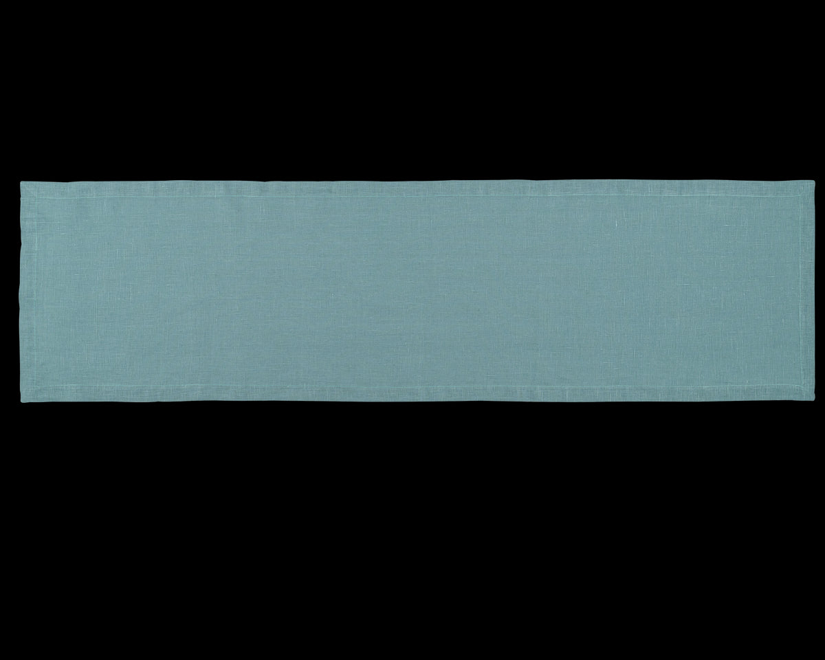 A linen table runner in the color marine