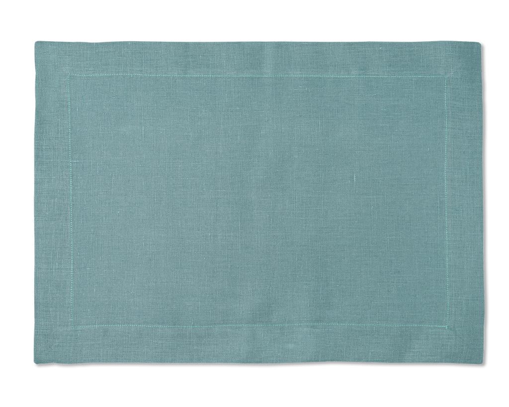 A linen placemat in the color marine