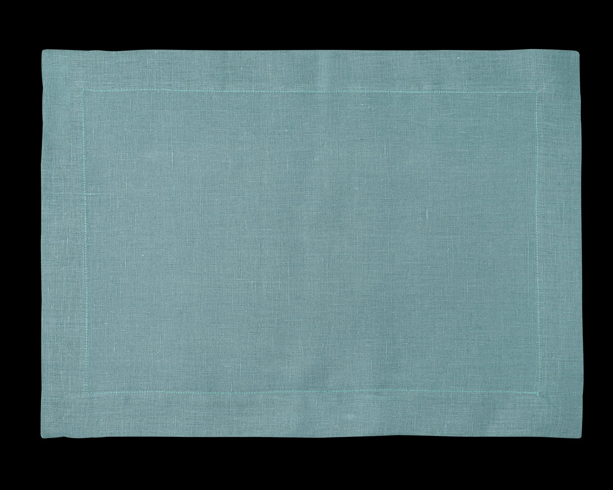 A linen placemat in the color marine