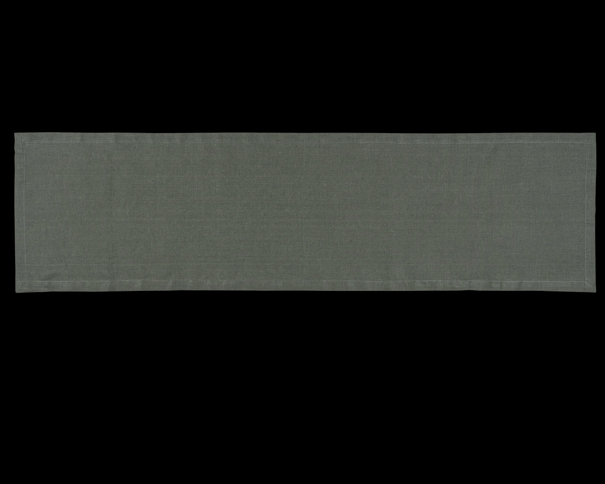 A linen table runner in the color pewter