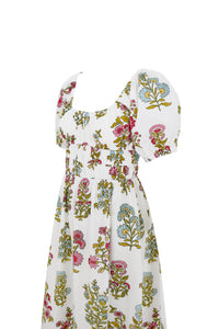 Floral dress with a matching headscarf on a white background