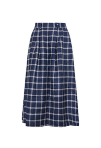 Front view of Queenby Skirt in St Andrews Check showcasing front pleats and A-line midi silhouette on a white background