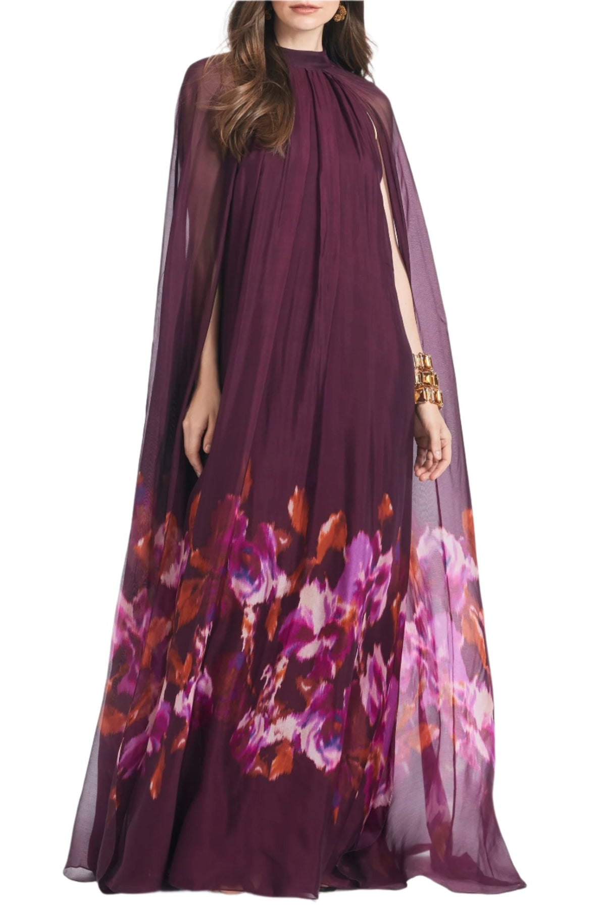 Front view of Tiana Gown in Mixed Berry Ikat Border showcasing sheer cape sleeves and floral border print against a white background