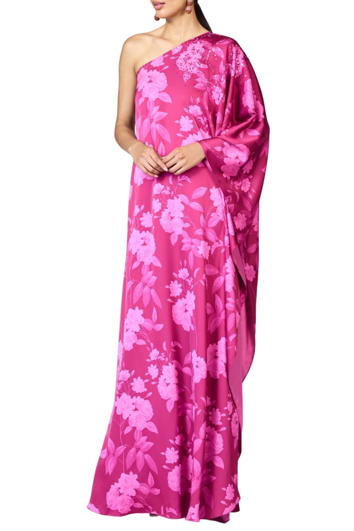 Front view of Embellished Demi Gown in Rhodolite Roses showcasing one shoulder silhouette and cascading drape on white
