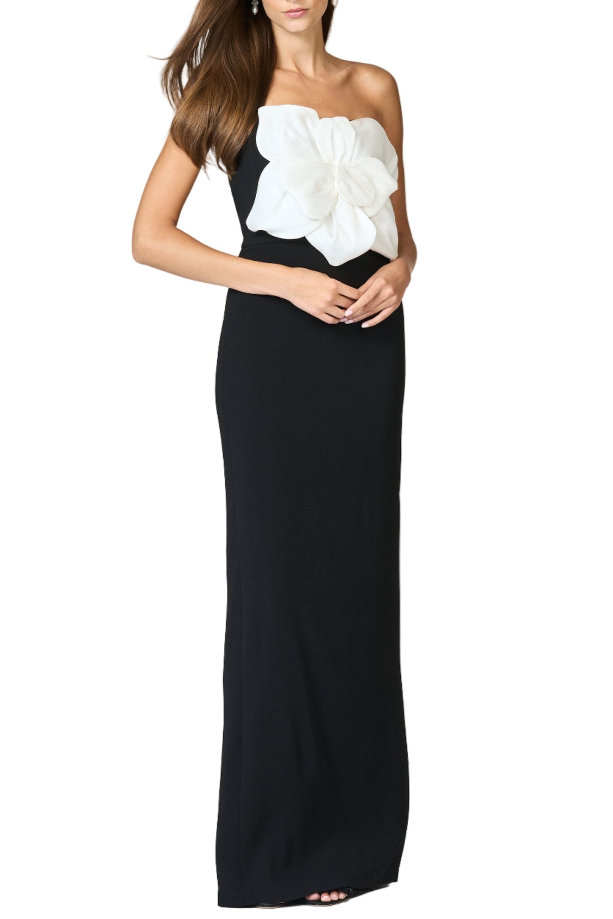 Front view of the Marist Gown in Ivory Black showcasing an oversized ivory floral appliqué on a model