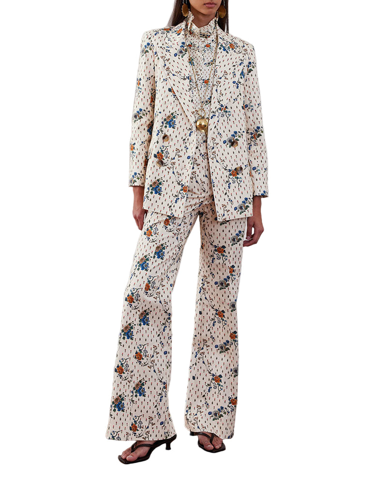Front view of Quinn Twill Jacket in Floral Cream, double-breasted with miniature floral print, worn by model