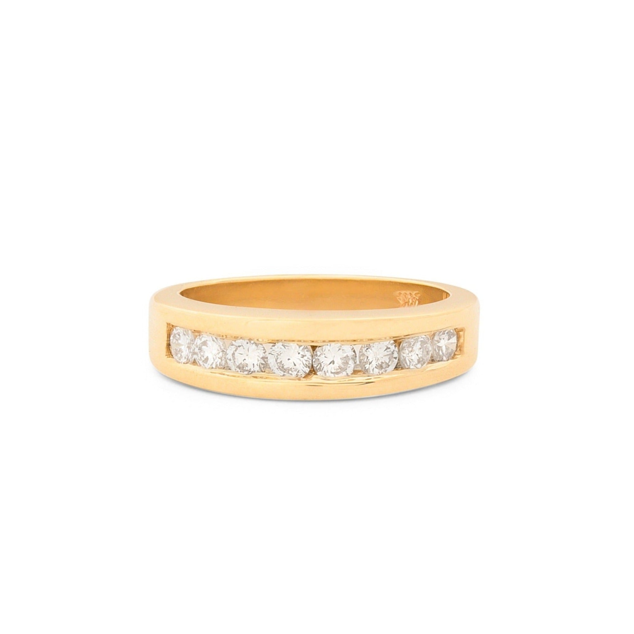 Channel set diamond and 14k gold half band ring