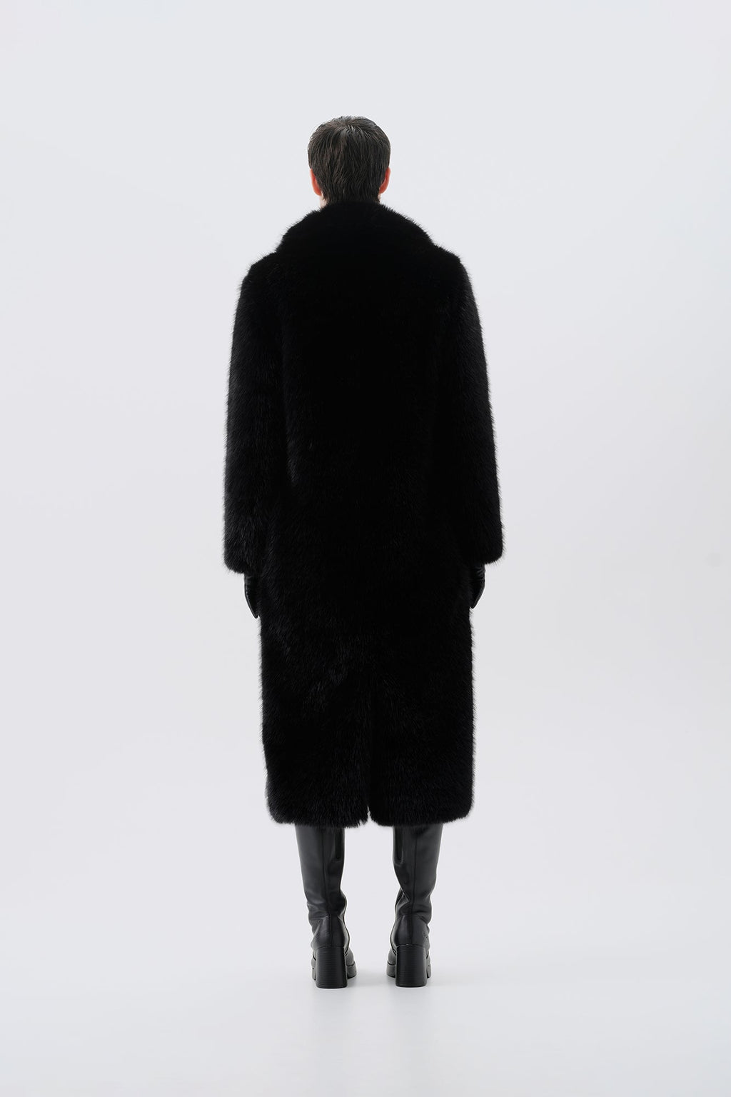 Long black faux fur coat, back view