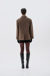 Brown oversized blazer with shoulder pads, back view