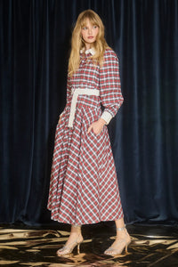 The Randolph Dress has a circle skirt, full length sleeves with button cuffs and optional belt.