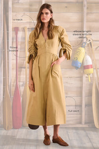 V-neck midi dress with a fitted bodice, full skirt, elbow-length sleeves finish with ties.