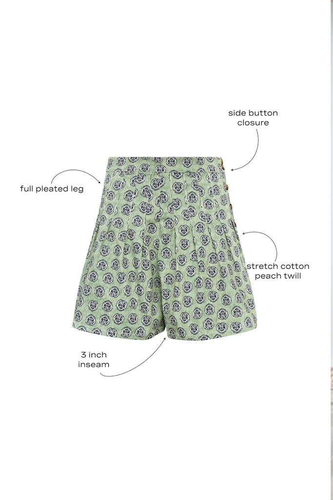 Stretch sateen pleated shorts with a banded waist in Navy Bird Block print.