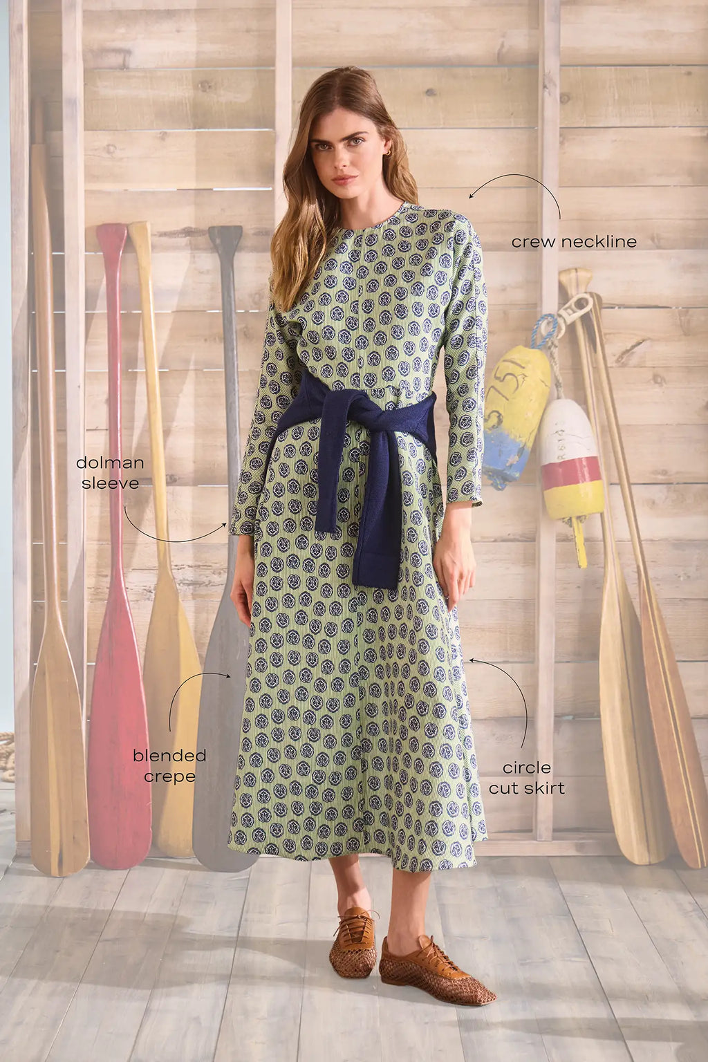 Midi dress with a clean crew neckline, modern dolman sleeves, with a circle-cut skirt.