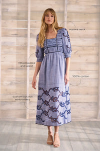 Embroidered Midi Dress with a square neckline, crochet lace tracing the bodice, skirt, and sleeves.