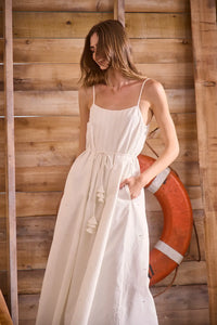 Ivory cotton-linen pearl embellished maxi dress with slim spaghetti straps and optional tie waist.