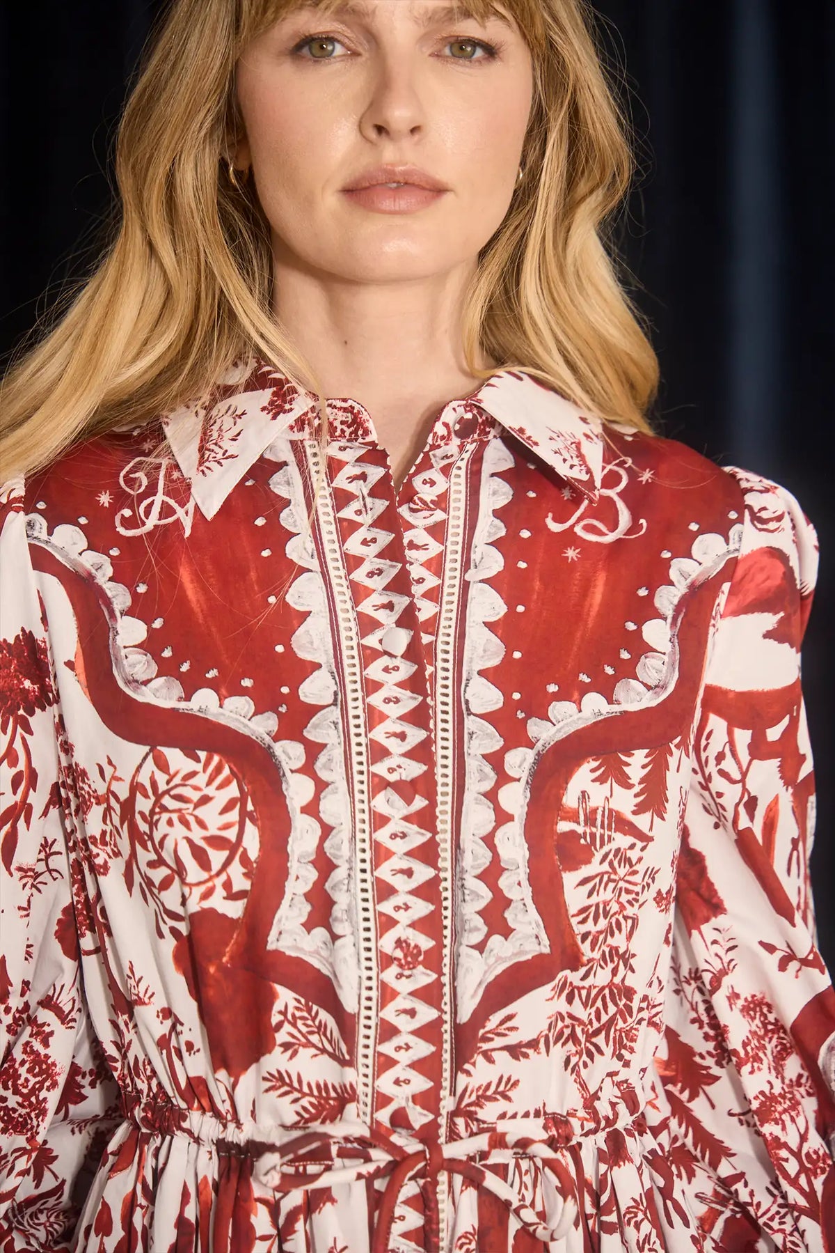 The Rosie Dress is full-length, collared neckline, long sleeve with button cuffs, & drawstring waist