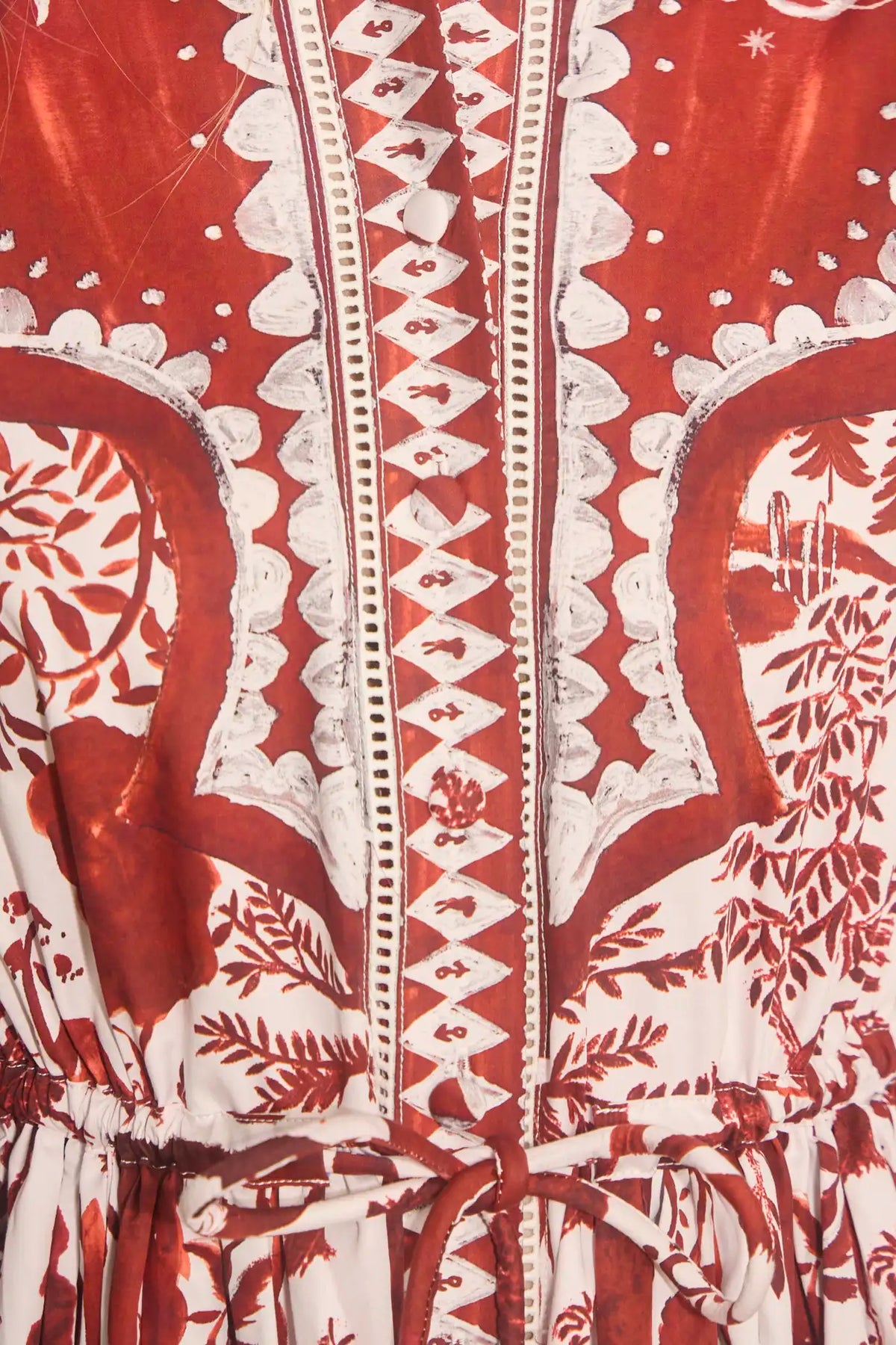 The Rosie Dress is full-length, collared neckline, long sleeve with button cuffs, & drawstring waist