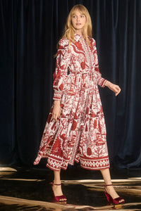 The Rosie Dress is full-length, collared neckline, long sleeve with button cuffs, & drawstring waist