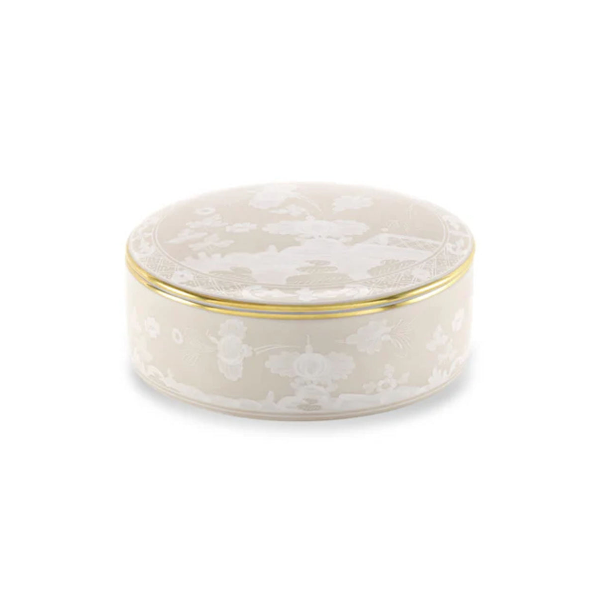 Three-quarter view of the Oriente Italiano round box with cover in Meringa, white floral porcelain and gold trim on white